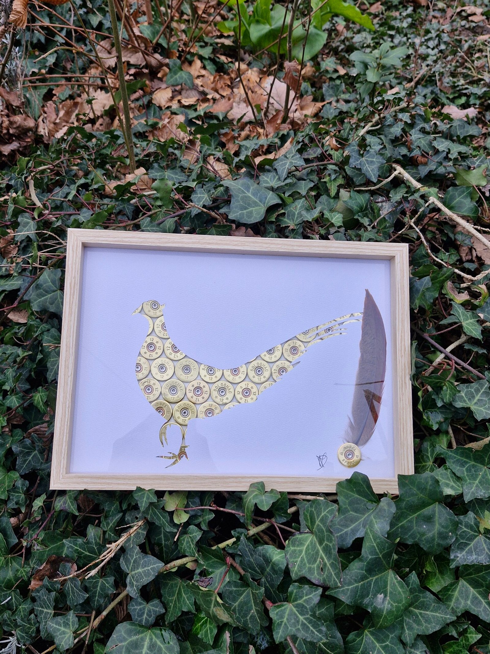 DECORATION FAISAN REALISE AVEC DE VRAIS DOUILLE DE CARTUCHES